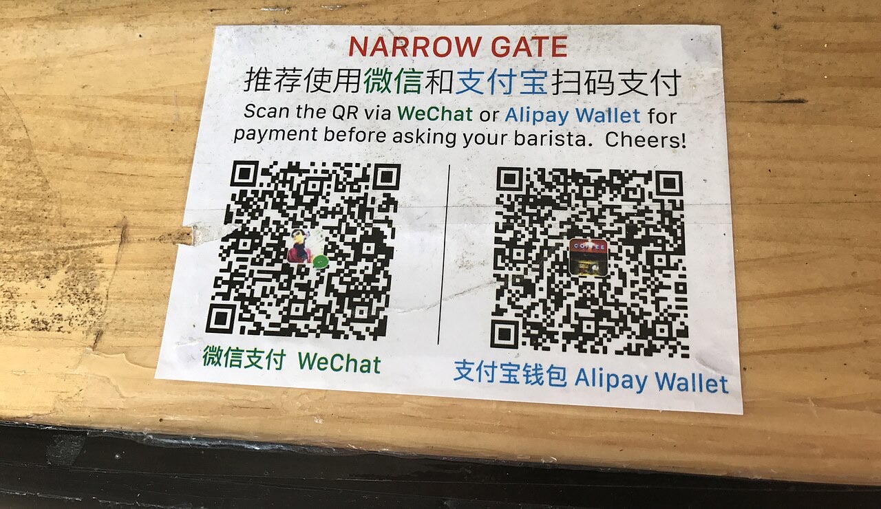 QR codes for mobile payment displayed at a shop counter in China