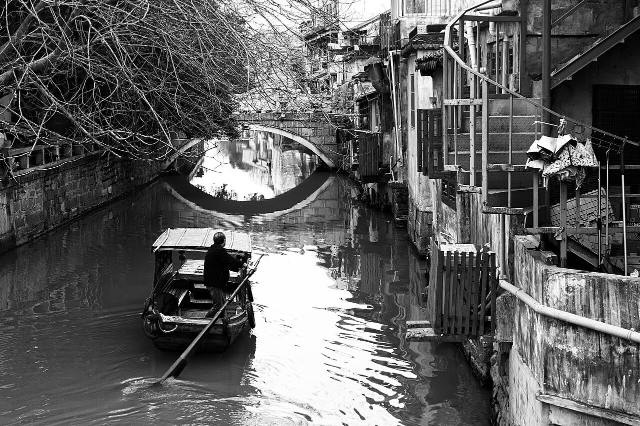 Canal lined with traditional houses in old Suzhou